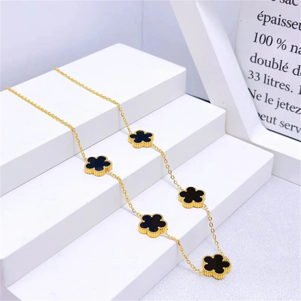 Gold-Plated Five-Leaf Flower Earring, Necklace & Bracelet Set – Elegant Jewelry Gift for Women.
